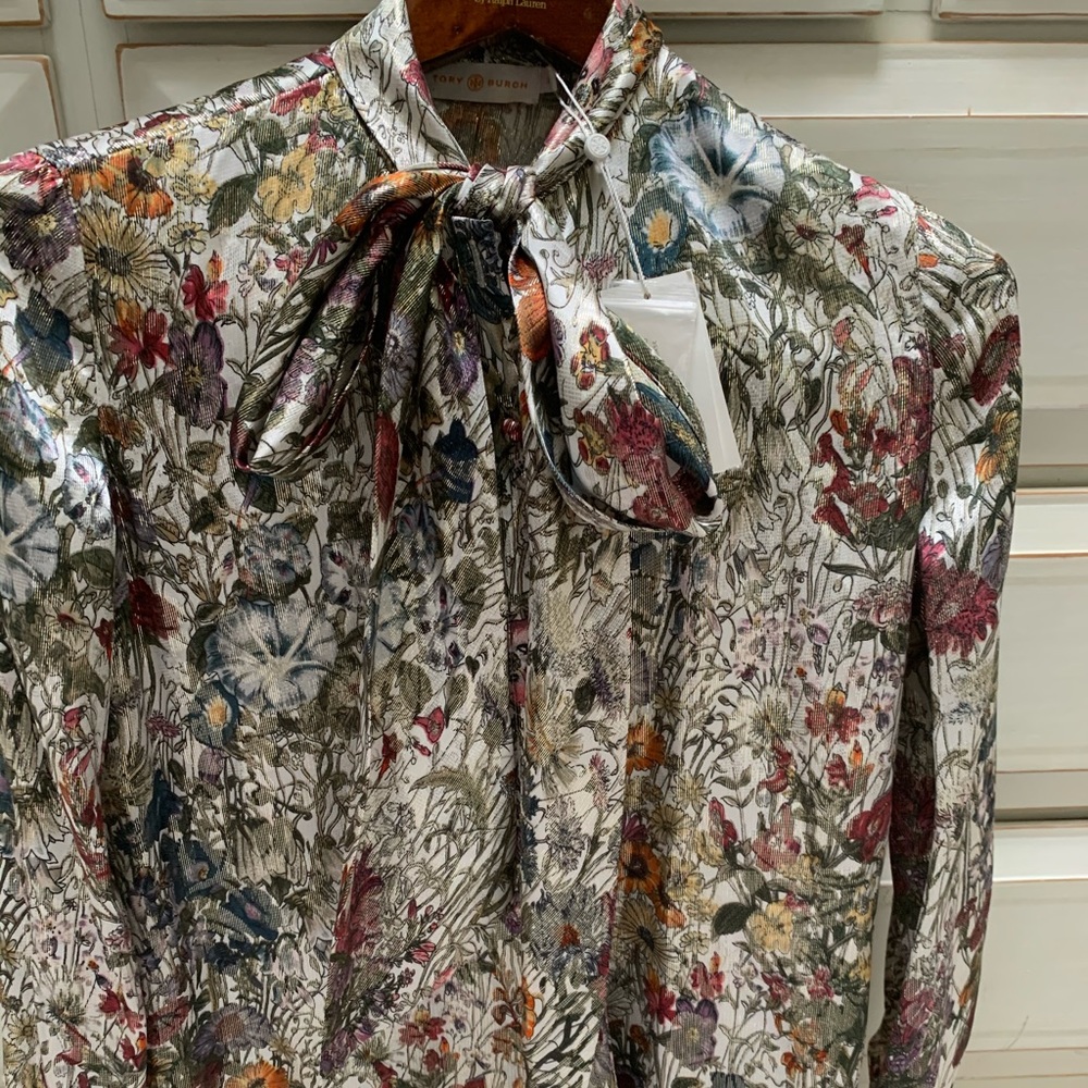 Tory Burch floral blouse with tie neck.
